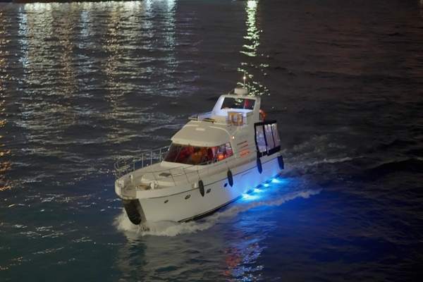 A boat in the water is maintained by Marine Kings of Miami with boat maintenance services.