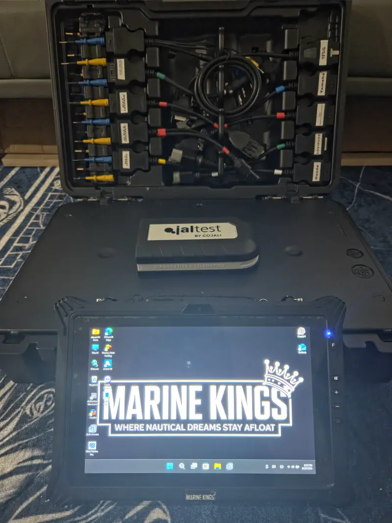 A laptop with branding reflects boat maintenance services from Marine Kings of Miami.