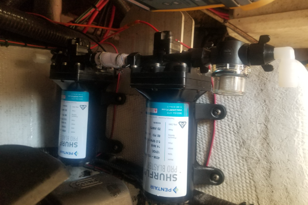 Water tanks on a wall are handled by Marine Kings of Miami with boat maintenance services.