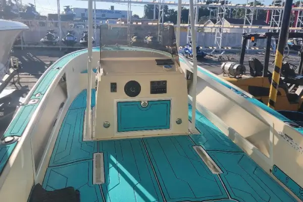  A blue and white deck is maintained by Marine Kings of Miami with boat maintenance services.