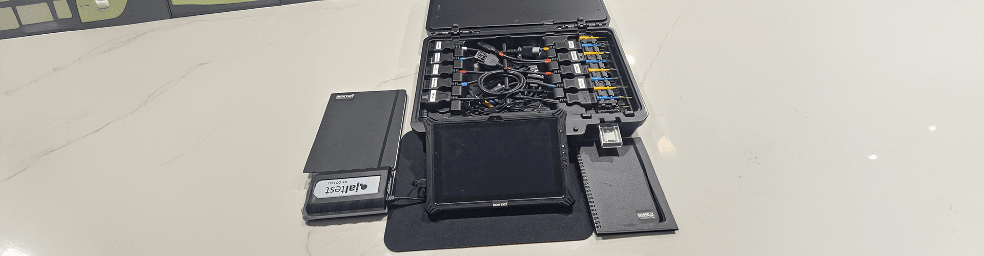 A snowboard with a clock reflects equipment unrelated but handled near tools by Marine Kings of Miami.