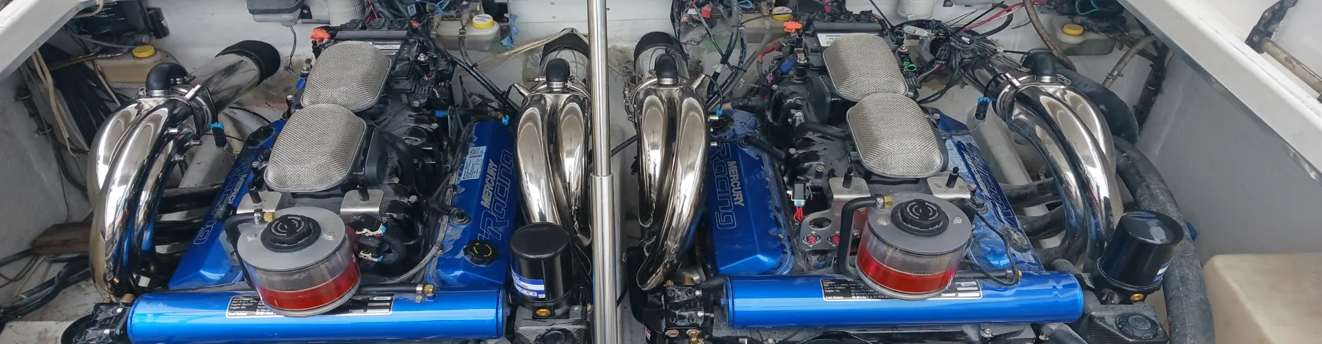 Bikes in a boat show transport setups supported by Marine Kings of Miami with boat maintenance services.