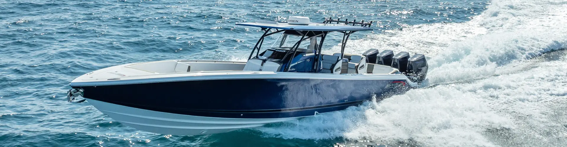 A fast-moving boat reflects boat maintenance services completed by Marine Kings of Miami in Miami, Florida.