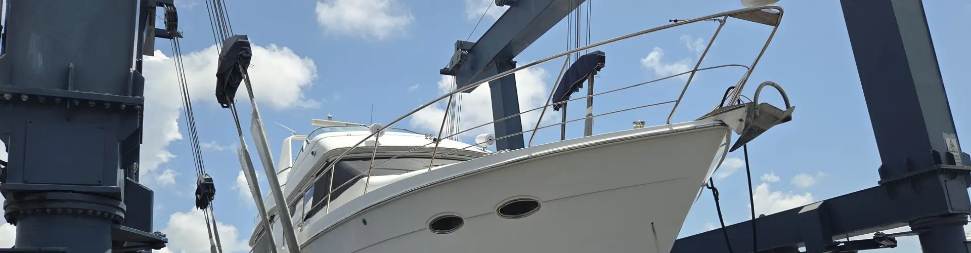 A docked vessel is maintained by Marine Kings of Miami with boat maintenance services in Miami, Florida.