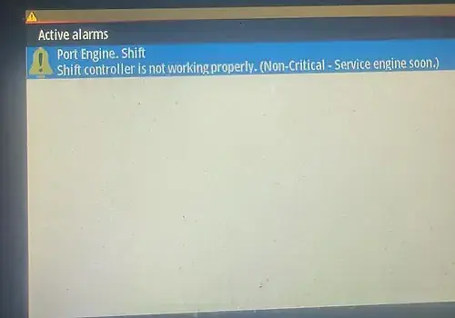  A computer screen message is reviewed by Marine Kings of Miami during marine electrical troubleshooting in Miami, Florida.