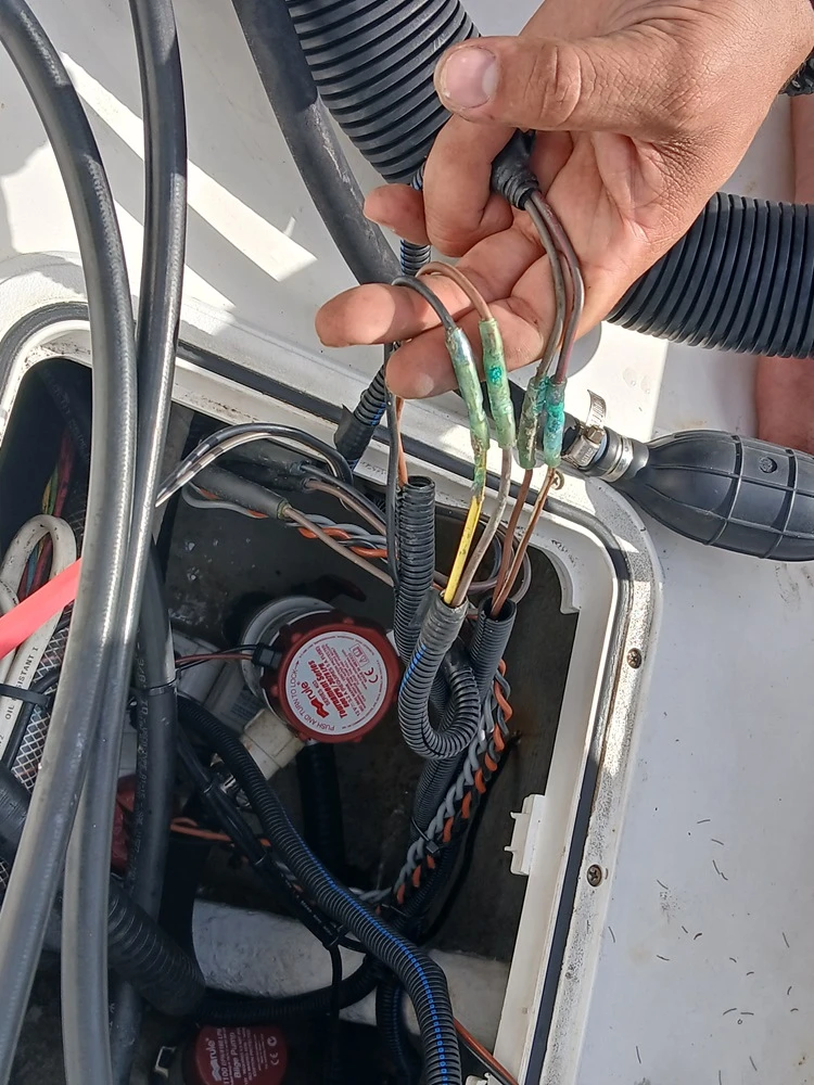 Wiring work on a boat is completed by Marine Kings of Miami using marine electrical troubleshooting.