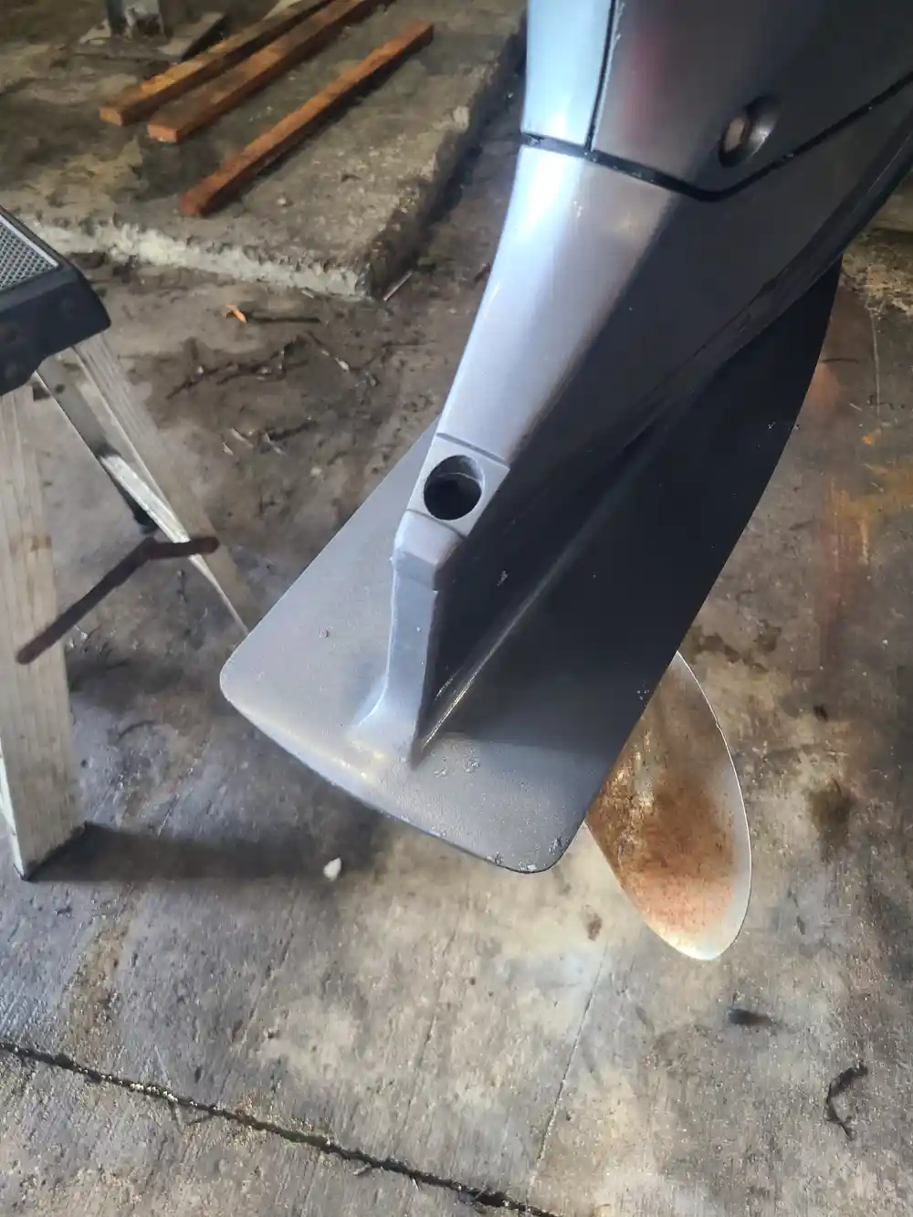 A metal object on a table is part of tools used by Marine Kings of Miami for boat maintenance services in Miami, Florida.