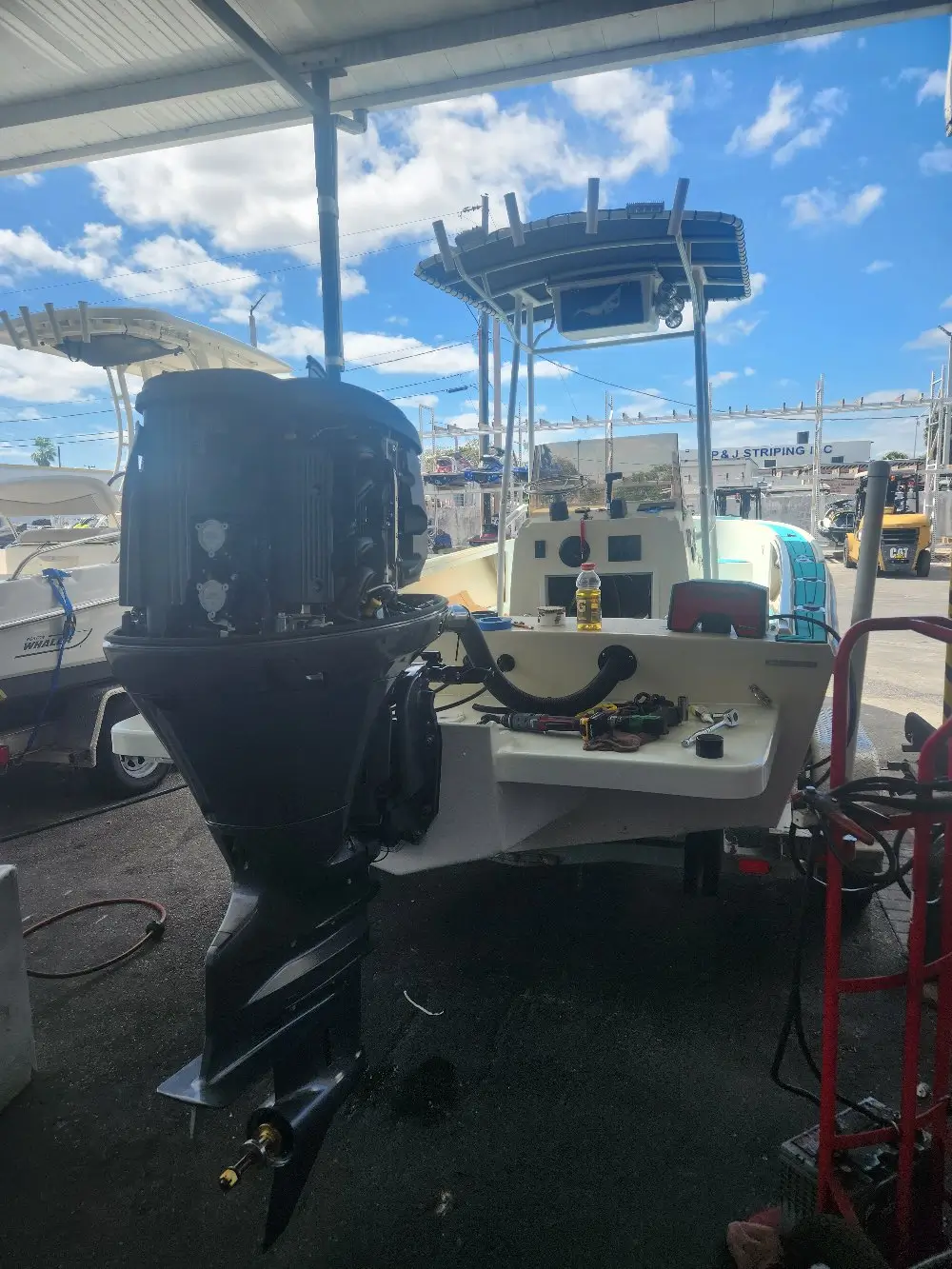 A roadside boat is handled by Marine Kings of Miami with boat repair Miami in Miami, Florida.