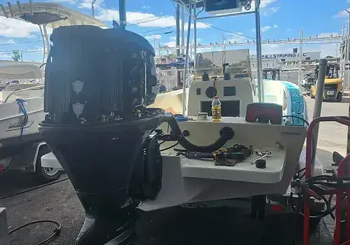 A roadside boat is handled by Marine Kings of Miami with boat repair Miami in Miami, Florida.