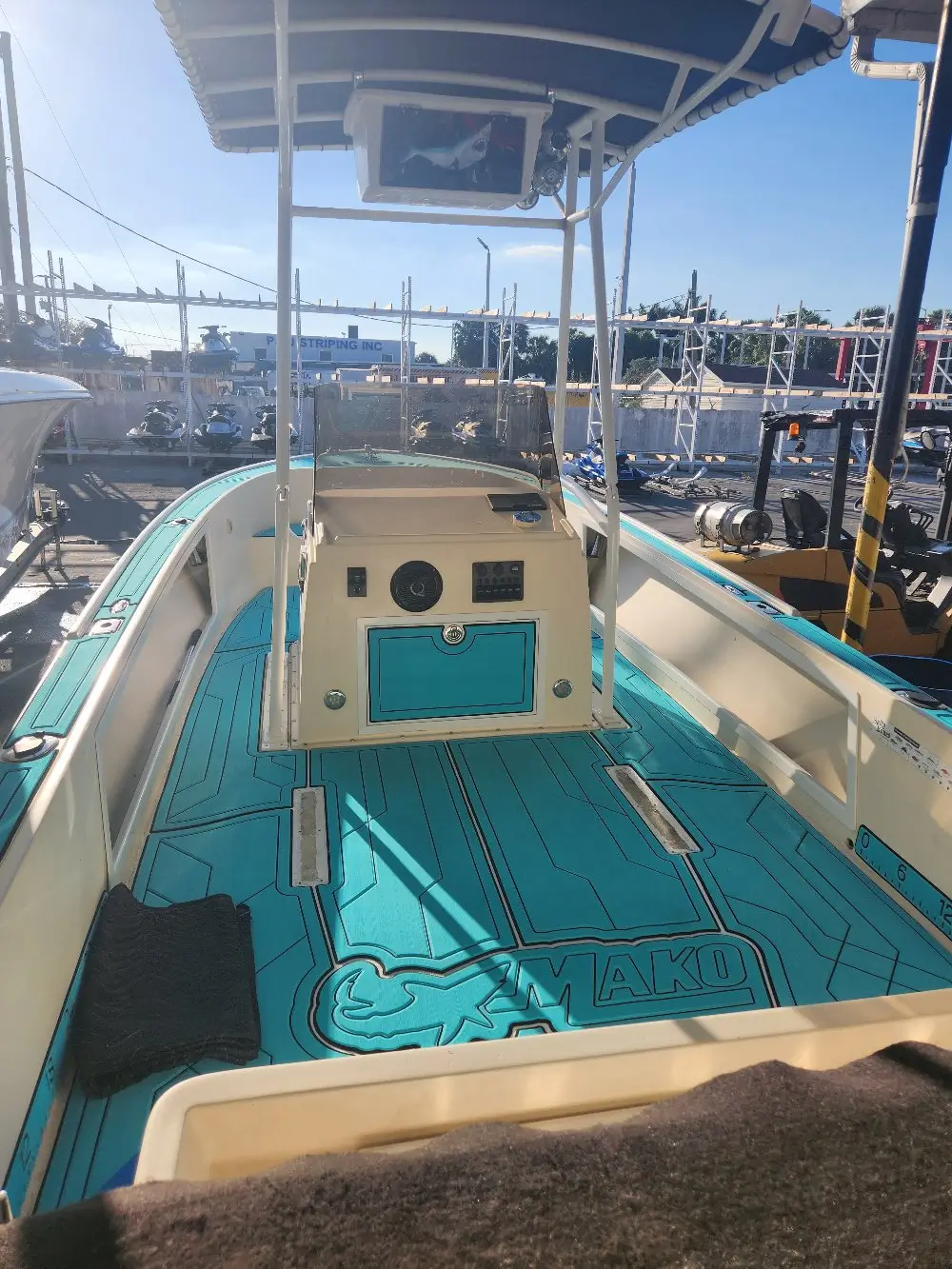 Blue and white boat surfaces are maintained by Marine Kings of Miami with boat maintenance services.