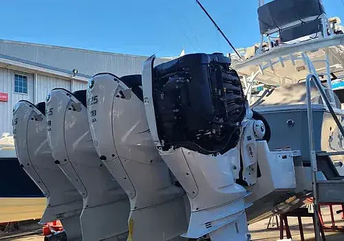 A boat parked in the lot is maintained by Marine Kings of Miami with boat maintenance services in Miami, Florida.