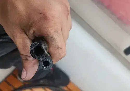 Applying paint reflects detailing work connected to boat maintenance services by Marine Kings of Miami.