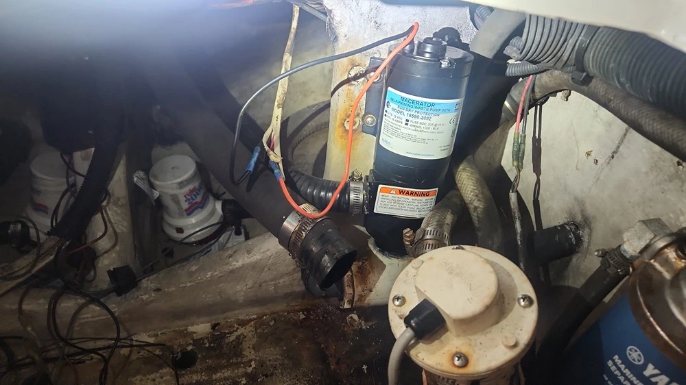 A small air conditioner is installed by Marine Kings of Miami using electrical services in Miami, Florida.