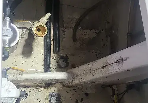 A box of metal parts is used by Marine Kings of Miami for boat repair Miami in Miami, Florida.