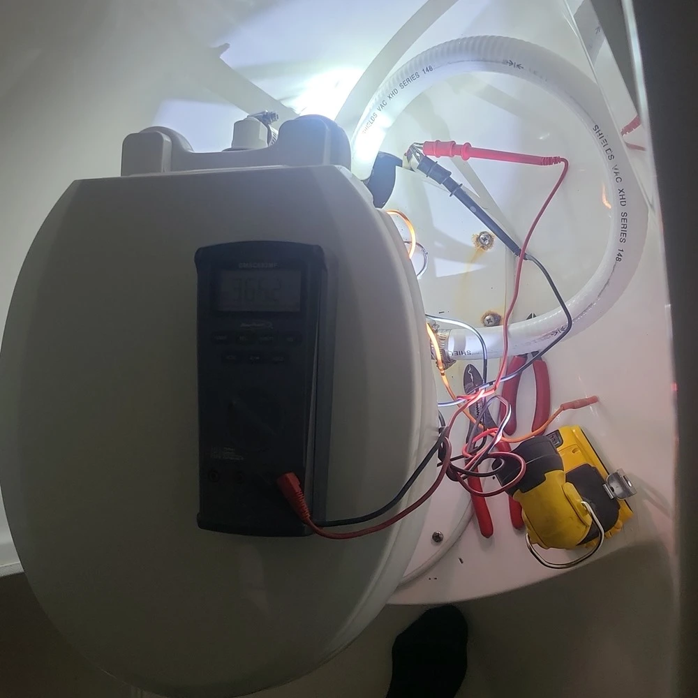 A toilet with wiring nearby is handled by Marine Kings of Miami with marine electrical troubleshooting.