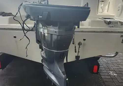 A boat engine is serviced by Marine Kings of Miami with outboard engine service.