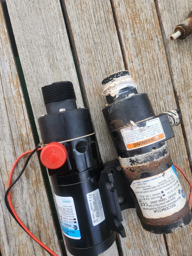  A small pump with a hose is used by Marine Kings of Miami for boat maintenance services.