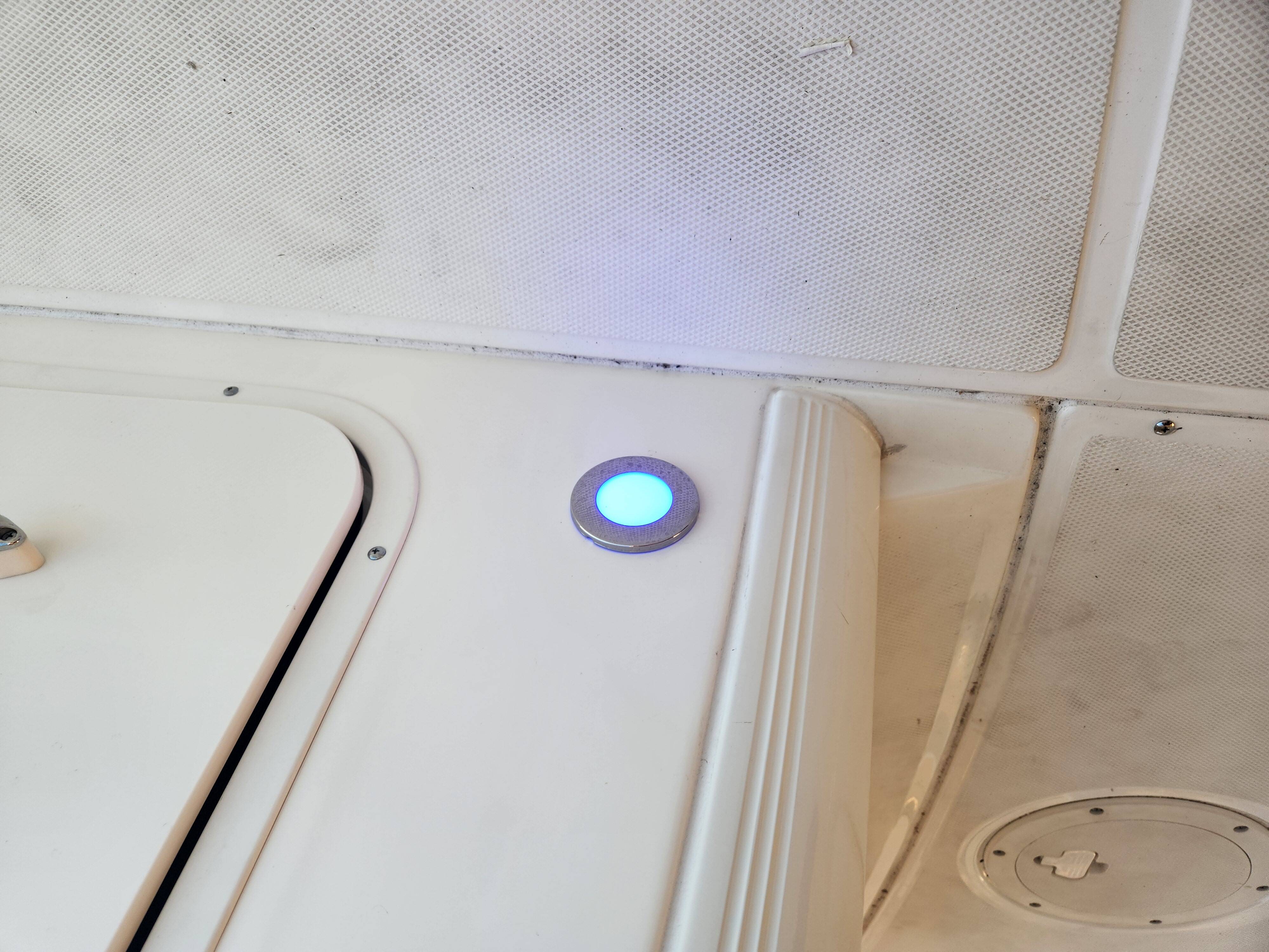 A refrigerator in a kitchen reflects spaces supported by Marine Kings of Miami with plumbing services in Miami, Florida.