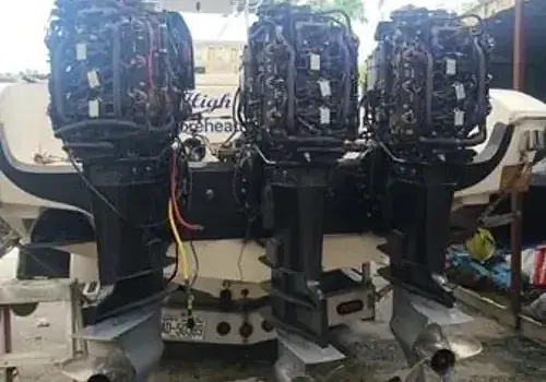 Four engines on a boat are serviced by Marine Kings of Miami using marine engine diagnostics in Miami, Florida.