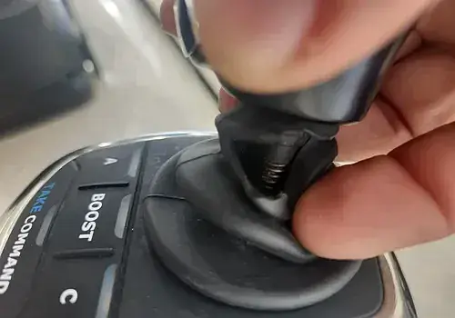 Battery removal using a power tool is completed by Marine Kings of Miami with boat repair Miami.