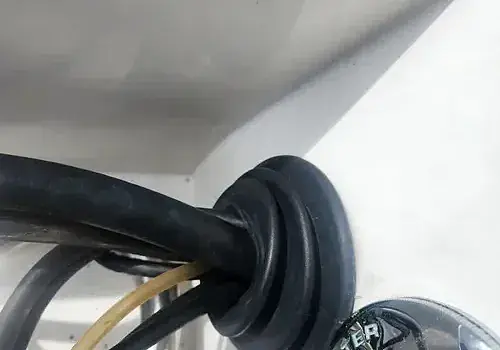 A light switch is installed by Marine Kings of Miami using marine electrical troubleshooting in Miami, Florida.