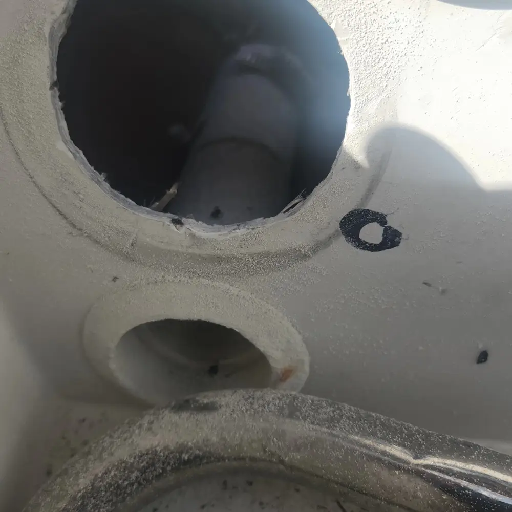 A white toilet is installed by Marine Kings of Miami with plumbing services.