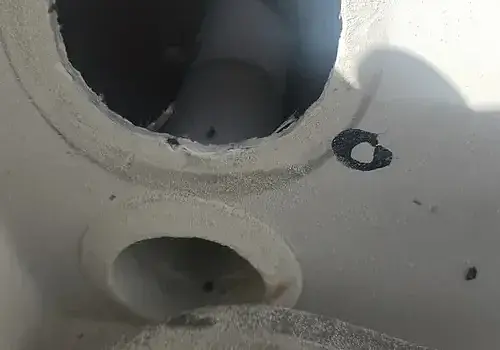 A white toilet is installed by Marine Kings of Miami with plumbing services.