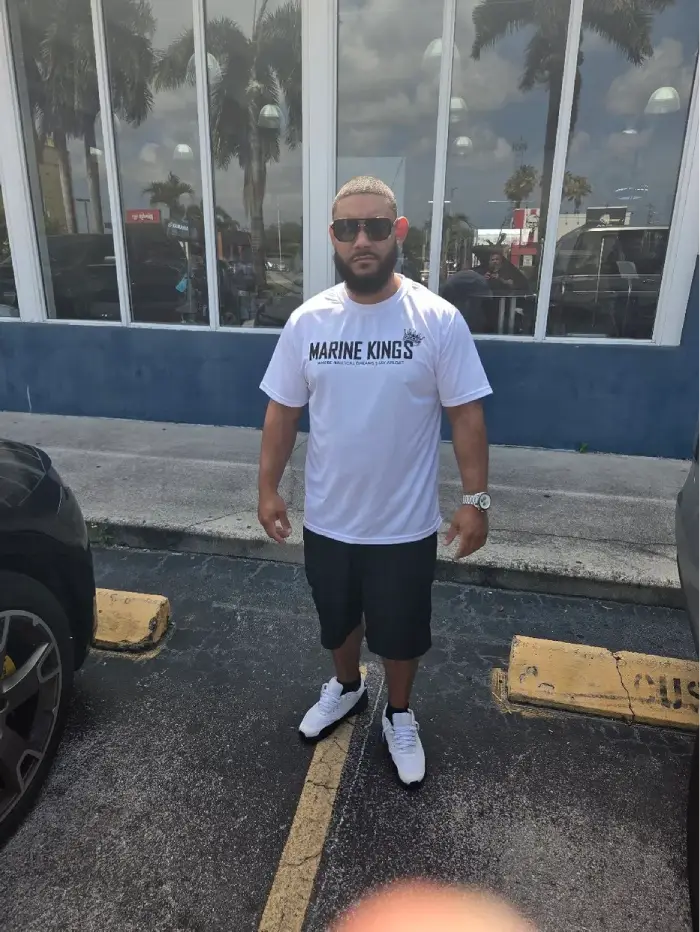 Alexander appears on camera promoting boat maintenance services from Marine Kings of Miami.