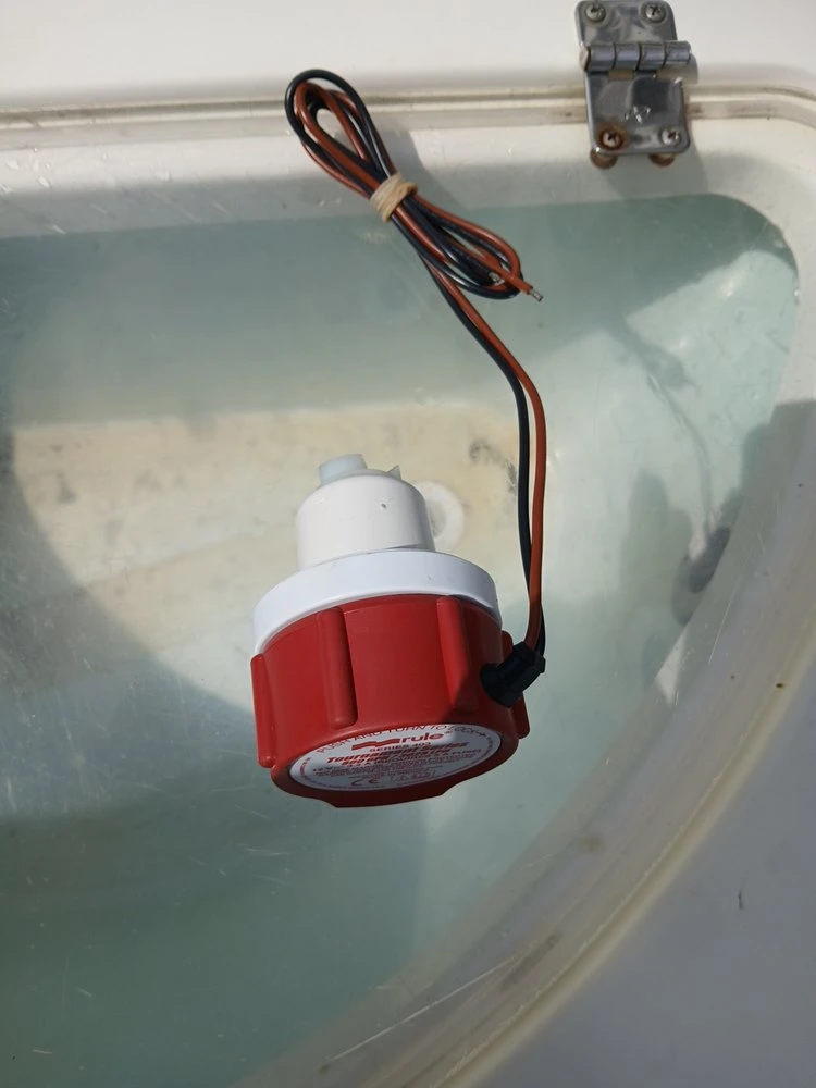  A red ceiling light is installed by Marine Kings of Miami with marine electrical troubleshooting.