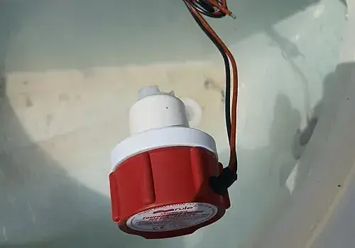  A red ceiling light is installed by Marine Kings of Miami with marine electrical troubleshooting.