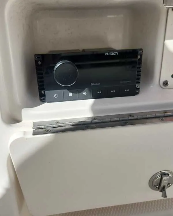  A car radio install reflects electrical work similar to marine electrical troubleshooting by Marine Kings of Miami.