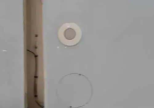  A white door with openings is handled by Marine Kings of Miami with boat repair Miami in Miami, Florida.