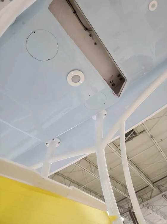 Ceiling wiring is inspected by Marine Kings of Miami with marine electrical troubleshooting.