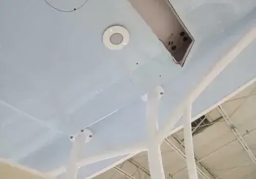 Ceiling wiring is inspected by Marine Kings of Miami with marine electrical troubleshooting.