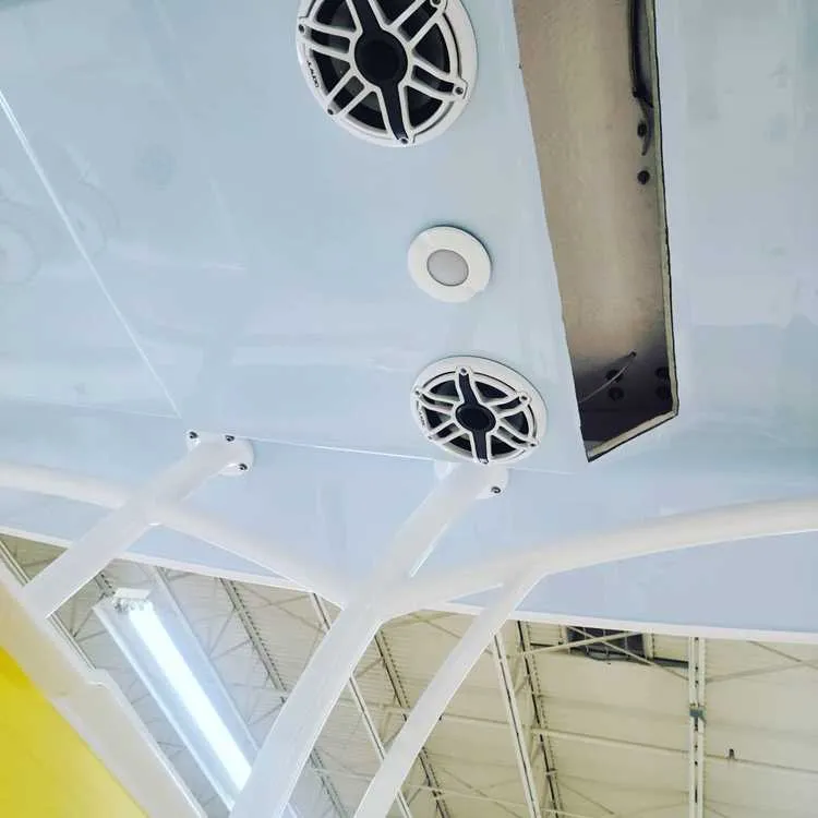 Painted ceiling surfaces are part of workspaces used by Marine Kings of Miami for boat maintenance services in Miami, Florida.