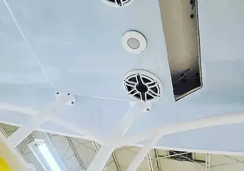 Painted ceiling surfaces are part of workspaces used by Marine Kings of Miami for boat maintenance services in Miami, Florida.