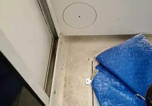  A blanket on the floor reflects workspace areas used by Marine Kings of Miami for boat maintenance services.