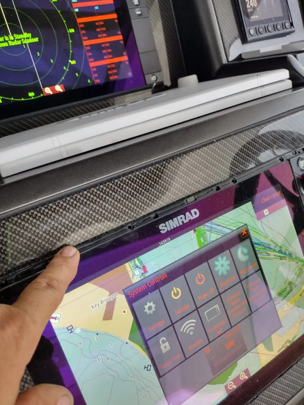 Screen installation work is completed by Marine Kings of Miami with marine electrical troubleshooting in Miami, Florida.