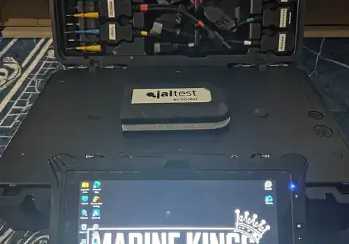 A gaming laptop is used by Marine Kings of Miami for marine electrical troubleshooting in Miami, Florida.