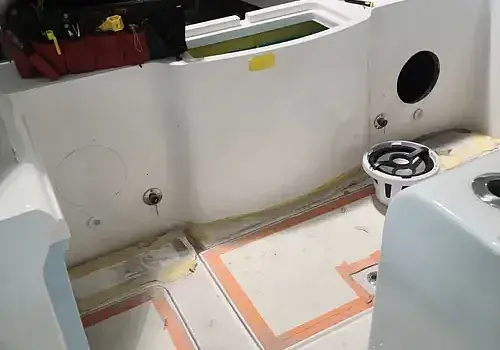 A white toilet is installed by Marine Kings of Miami with plumbing services.