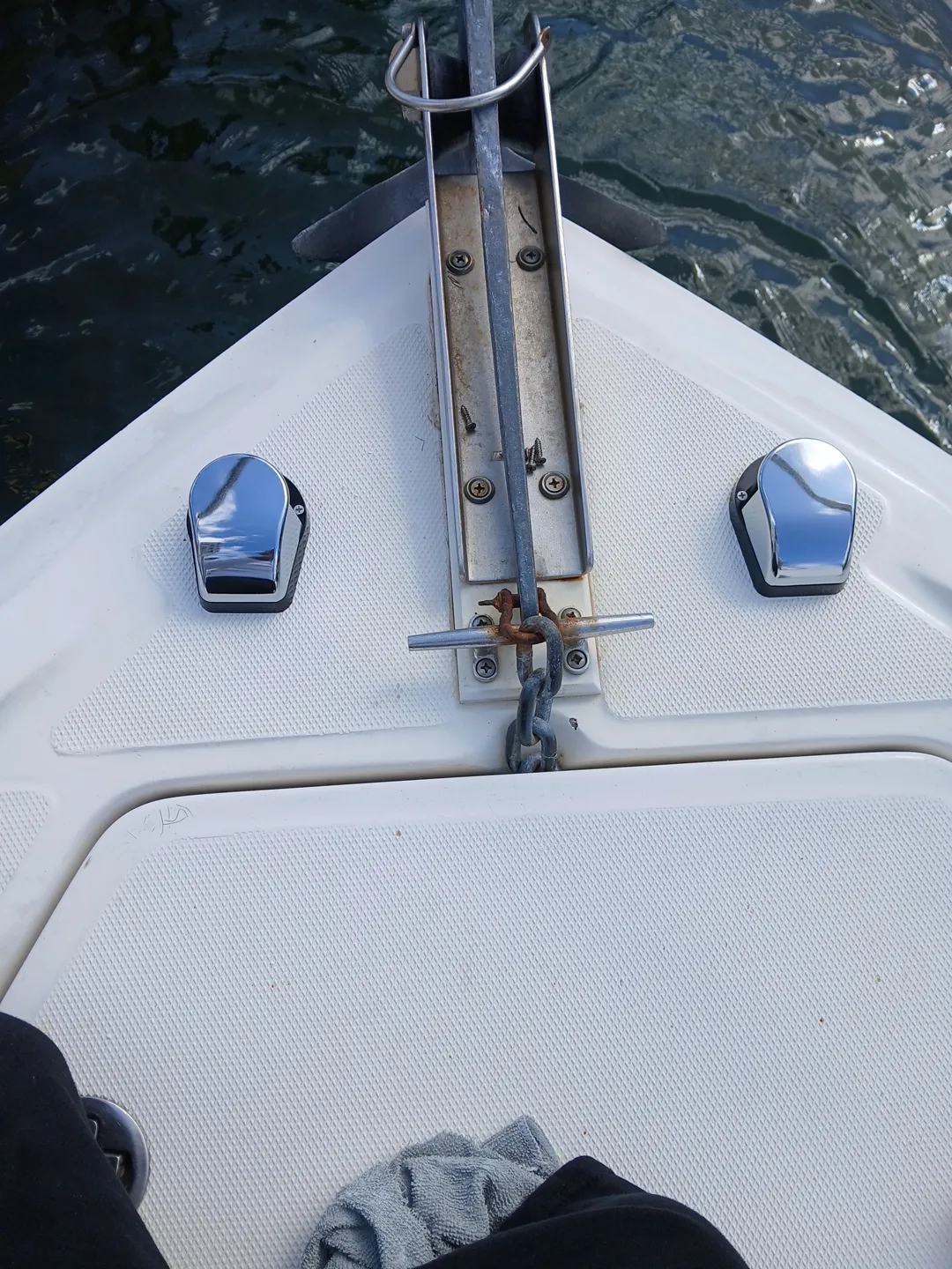 Metal latches on a boat are installed by Marine Kings of Miami with boat repair Miami.