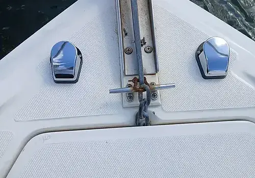 Metal latches on a boat are installed by Marine Kings of Miami with boat repair Miami.