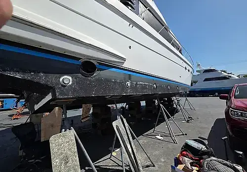  A towed vessel is transported for boat repair Miami by Marine Kings of Miami in Miami, Florida.