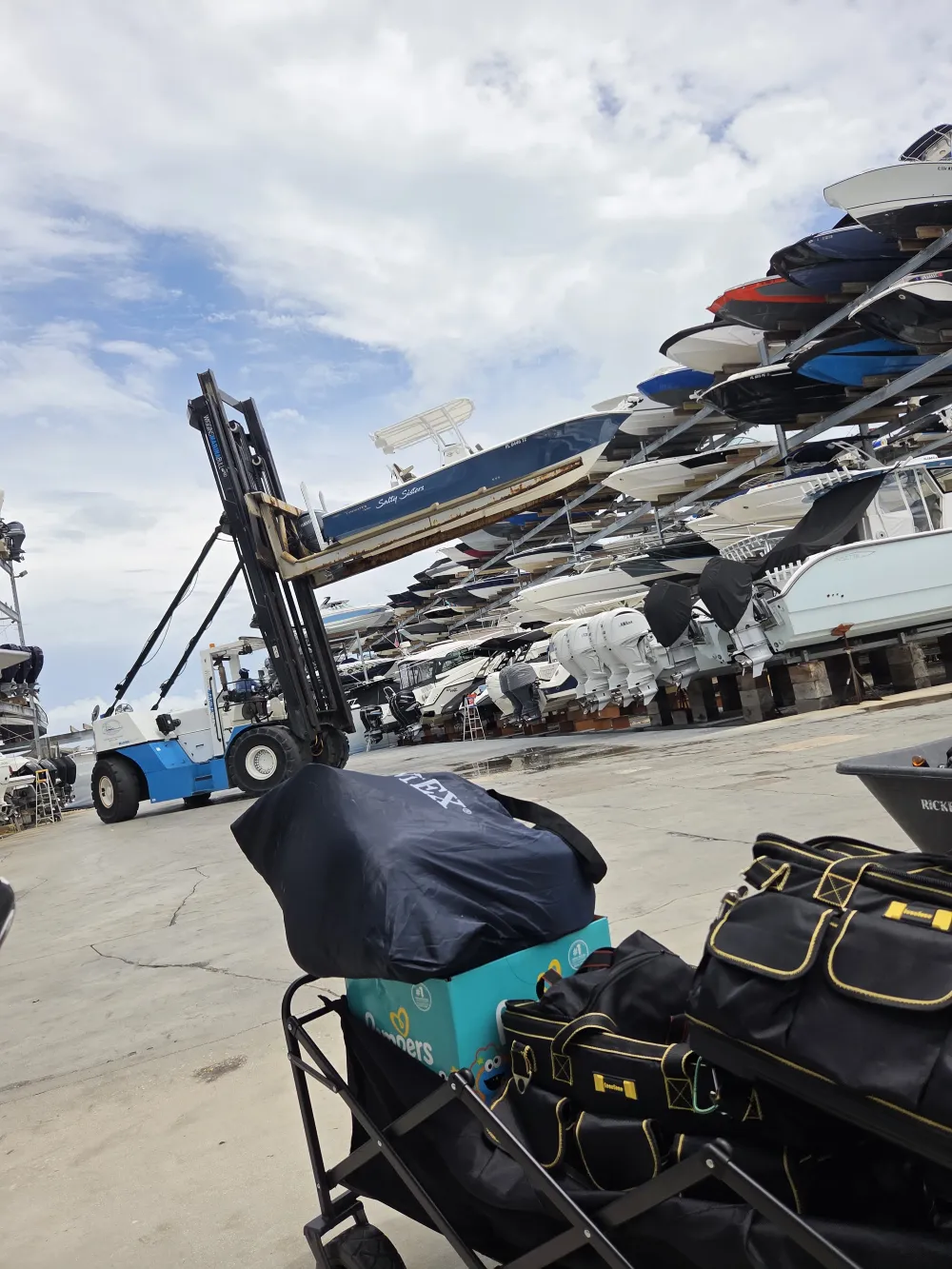  A technician holding equipment represents boat maintenance services from Marine Kings of Miami in Miami, Florida.