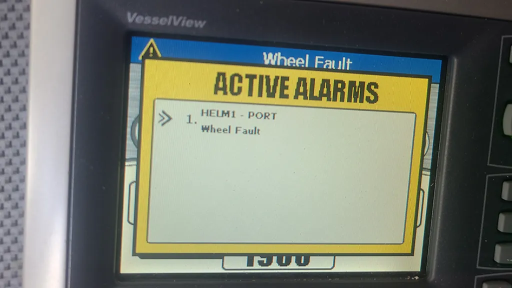 A small screen is reviewed by Marine Kings of Miami during marine electrical troubleshooting.