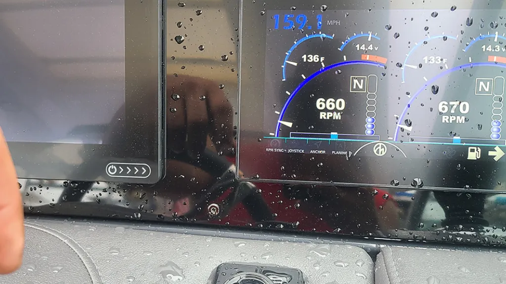 A wet dashboard is inspected by Marine Kings of Miami with marine electrical troubleshooting in Miami, Florida.