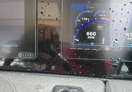 A wet dashboard is inspected by Marine Kings of Miami with marine electrical troubleshooting in Miami, Florida.