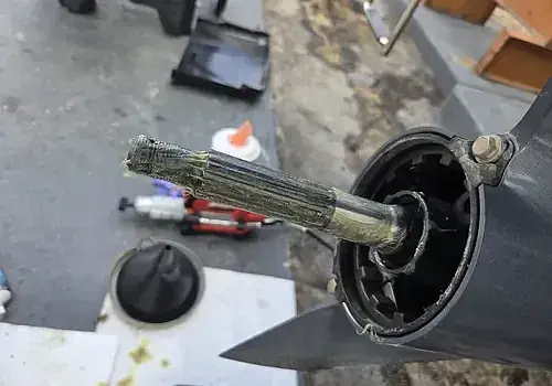  An engine removed from a car reflects mechanical work similar to boat repair Miami by Marine Kings of Miami.