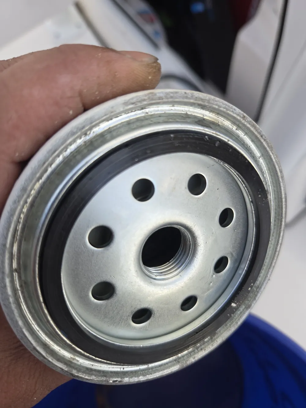 A metal canister is inspected by Marine Kings of Miami during boat maintenance services.