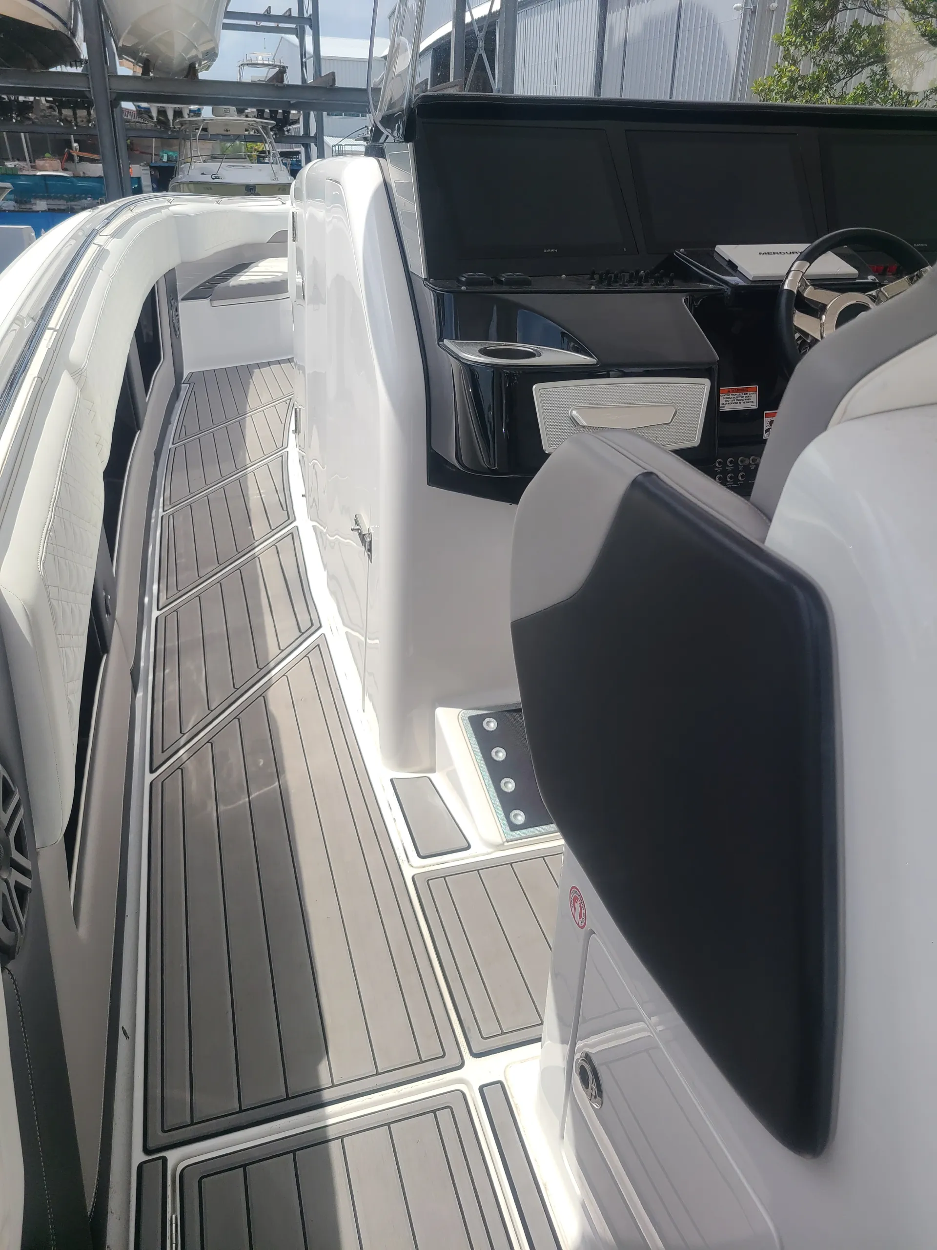  An open cockpit is serviced by Marine Kings of Miami using marine electrical troubleshooting.